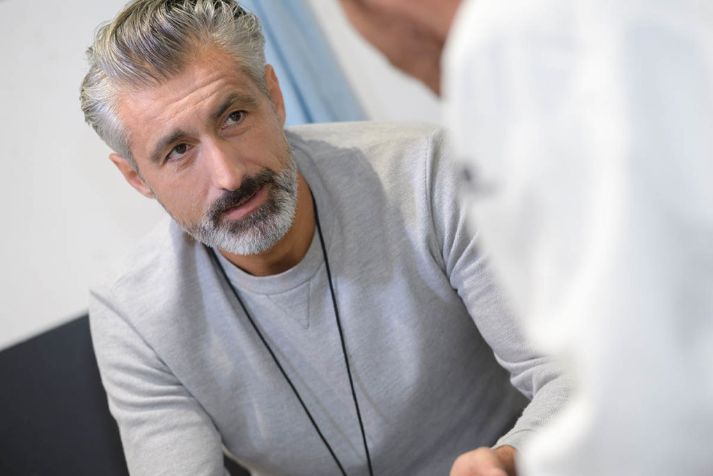 a person speaks with a doctor possibly asking is heroin an opioid